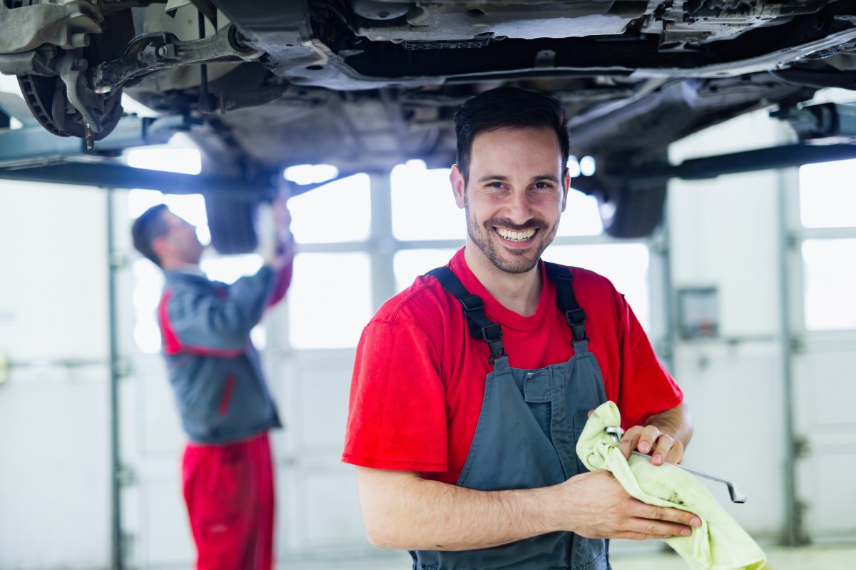 Mechanic working on car