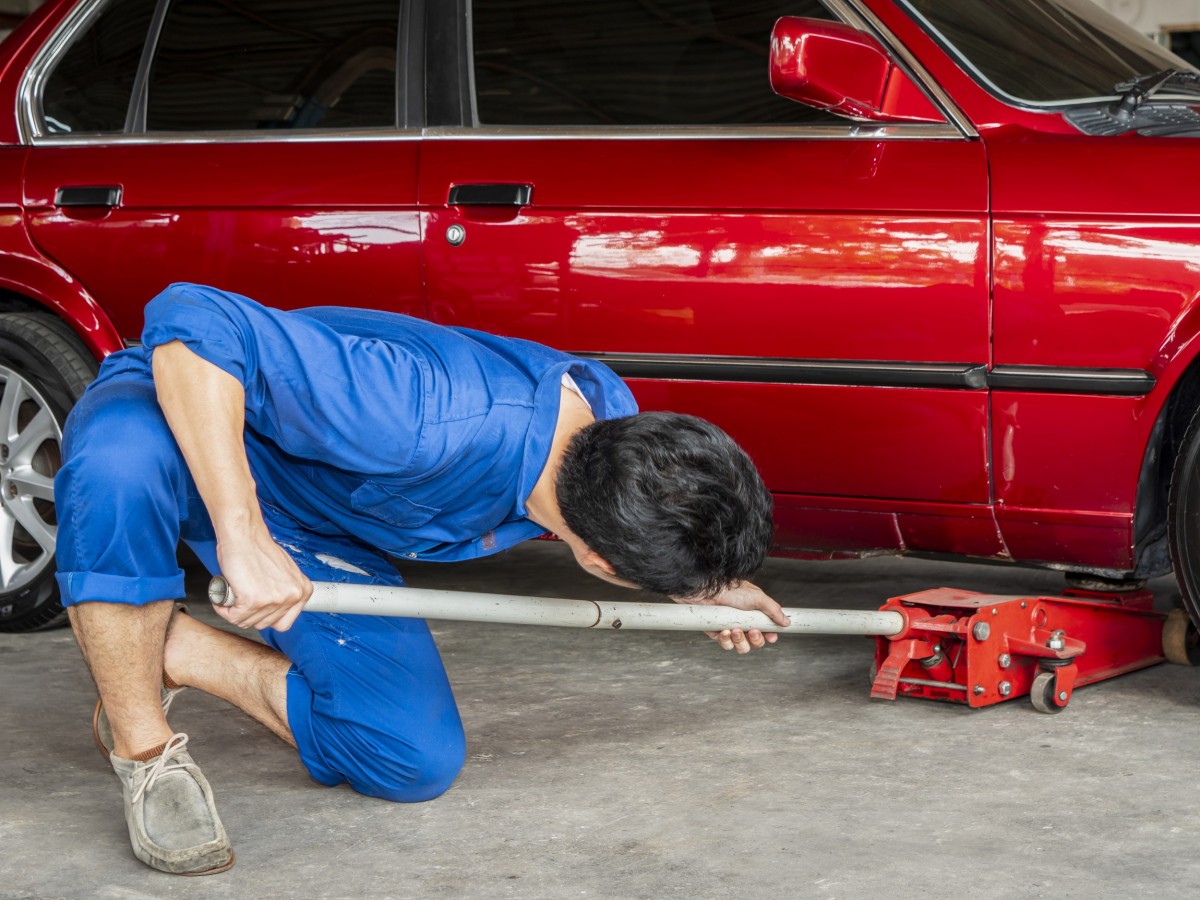 mechanic working on car 