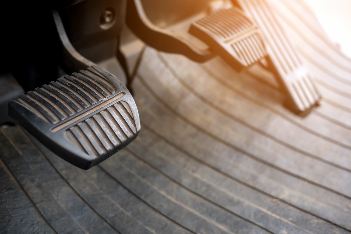 clutch of vehicle and close up of floorboard