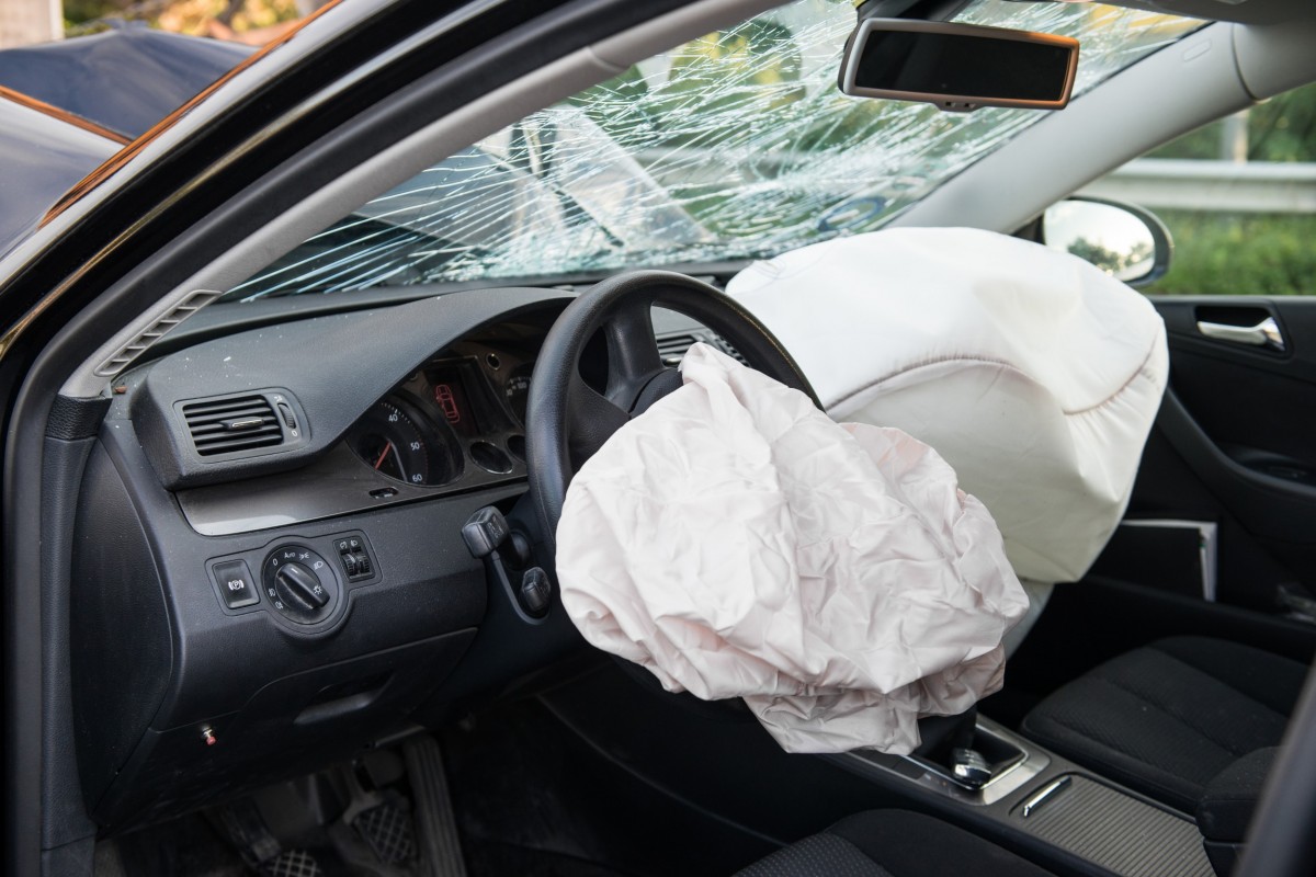 deployed airbag in car