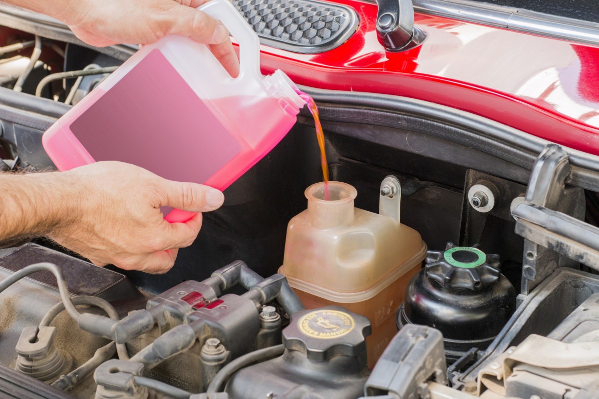 filling wiper fluid in car